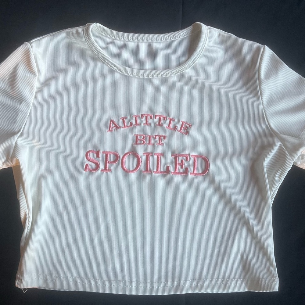 “a little bit spoiled” cropped shirt